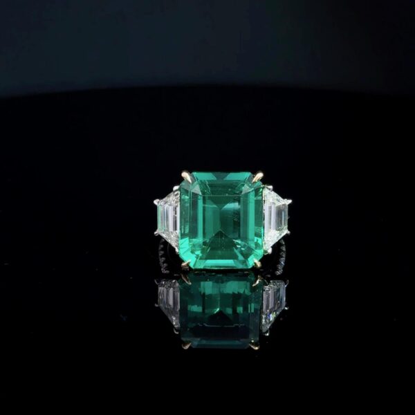 3 Stone emerald ring